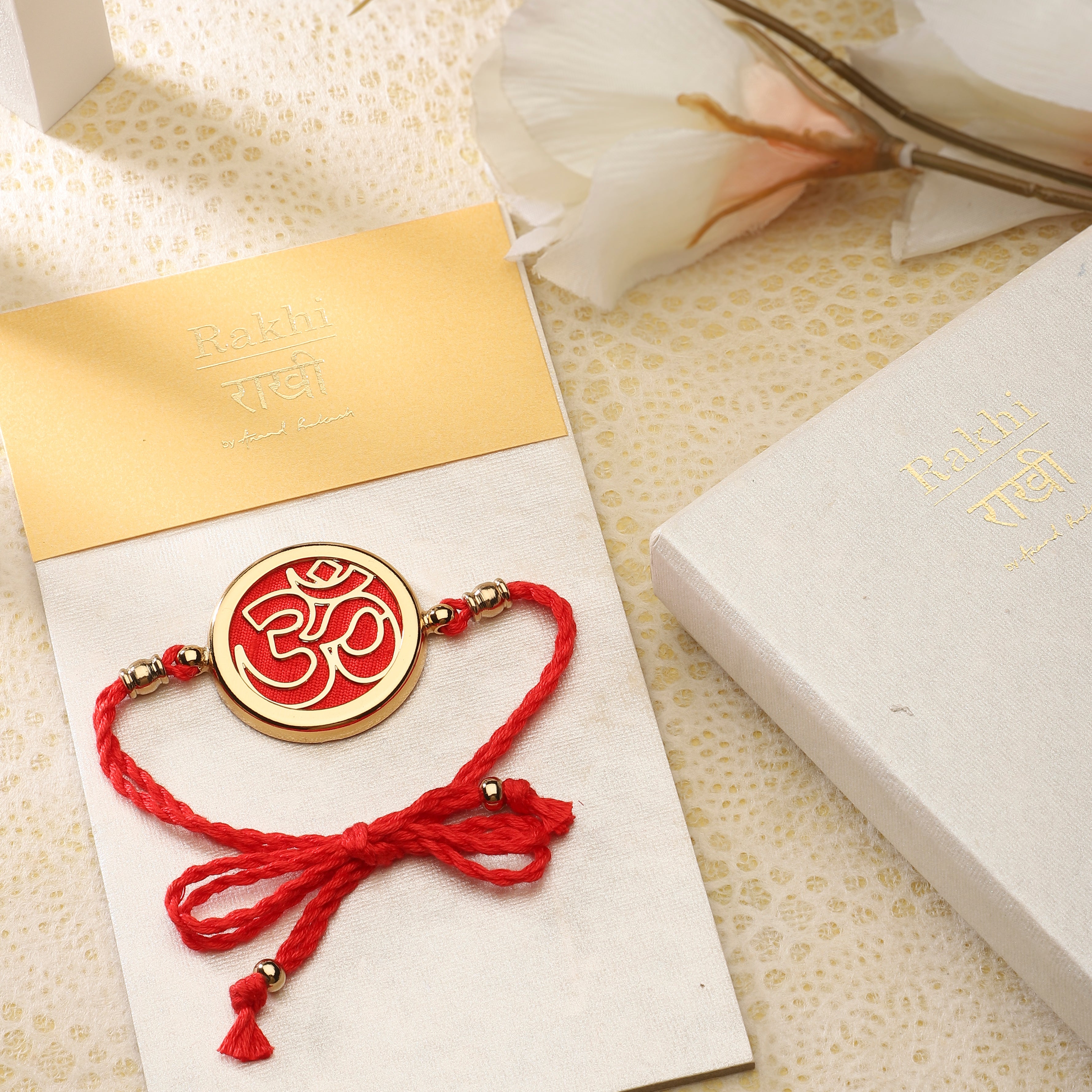 Goldplated Rakhi Yamini - Om