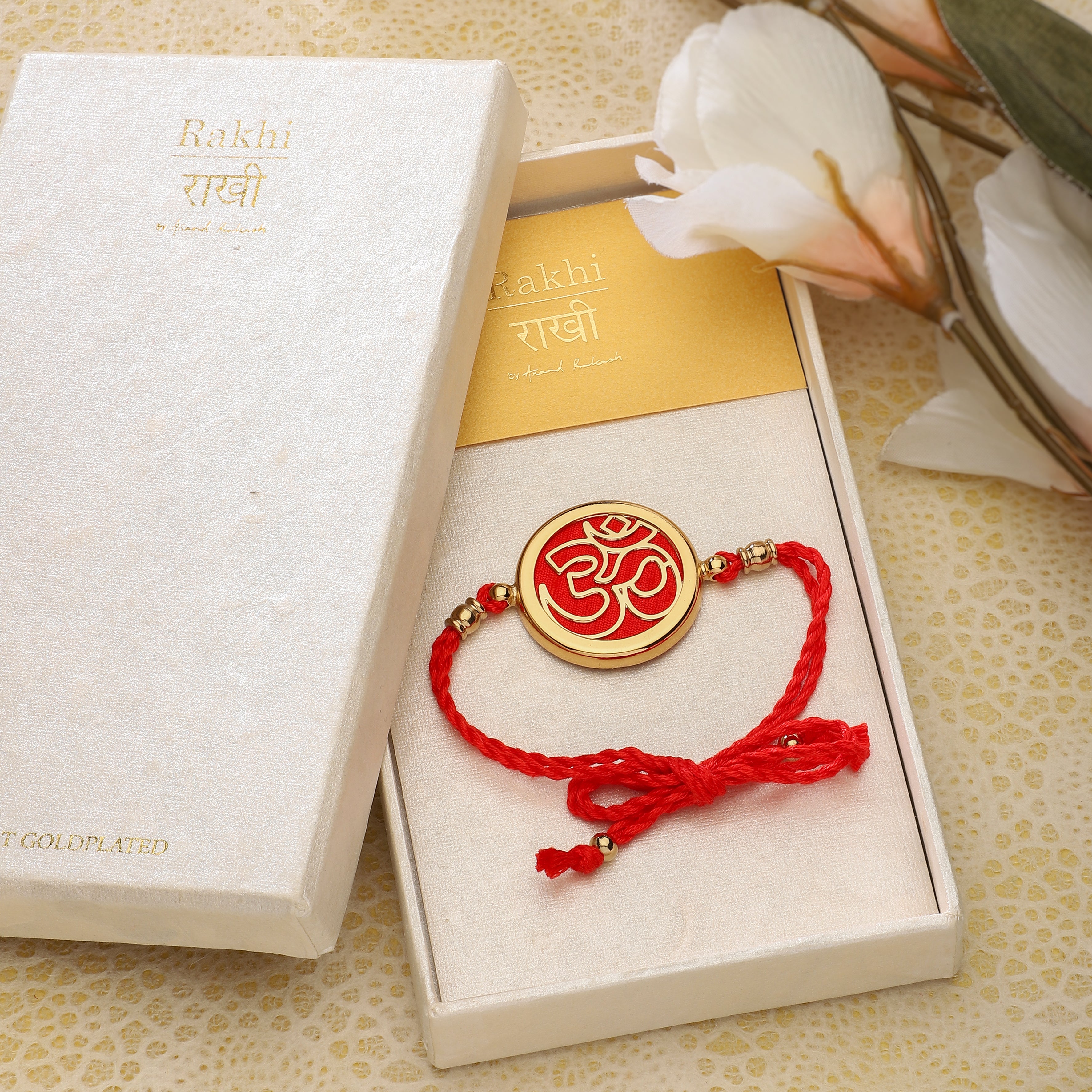 Goldplated Rakhi Yamini - Om