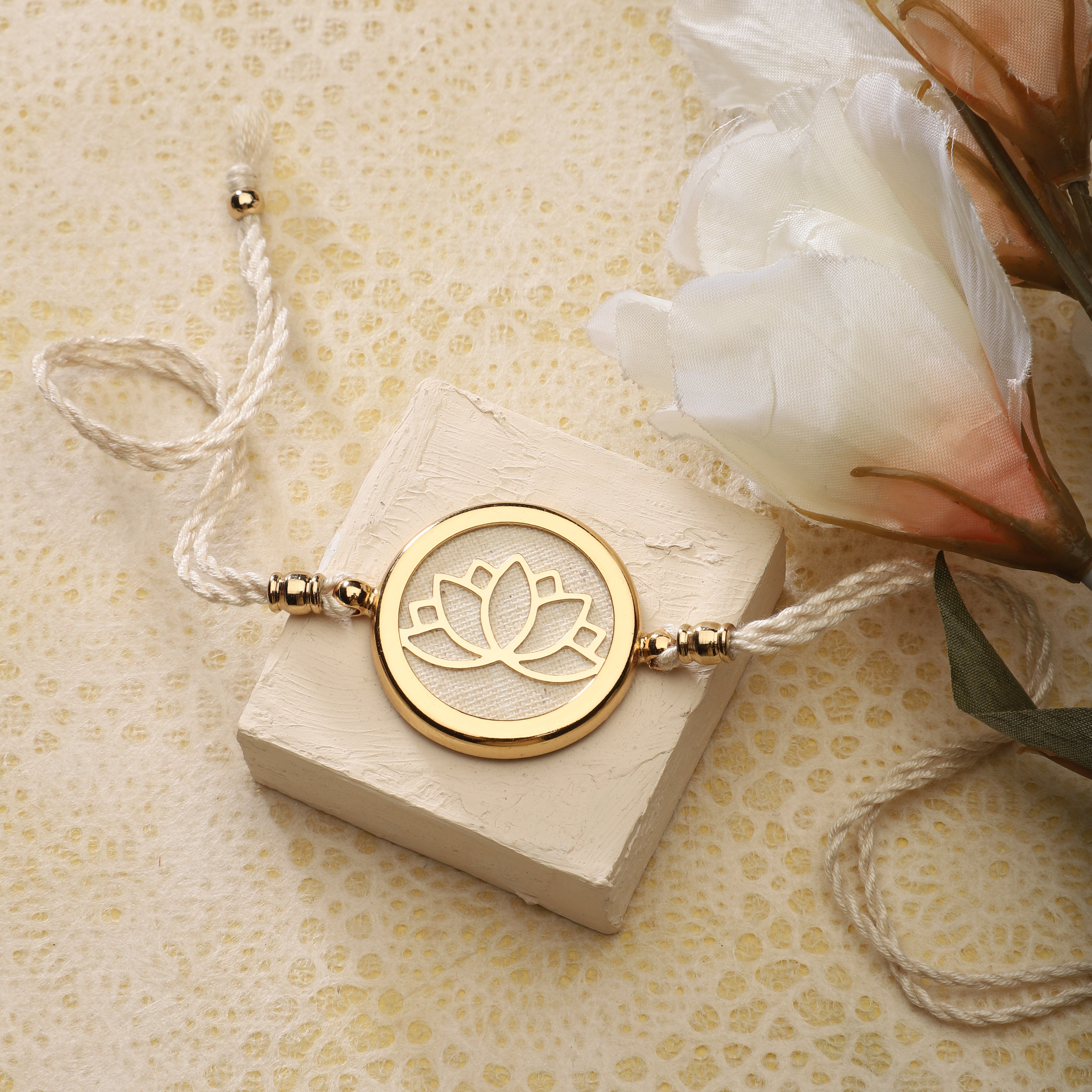 Goldplated Rakhi Yamini - Lotus