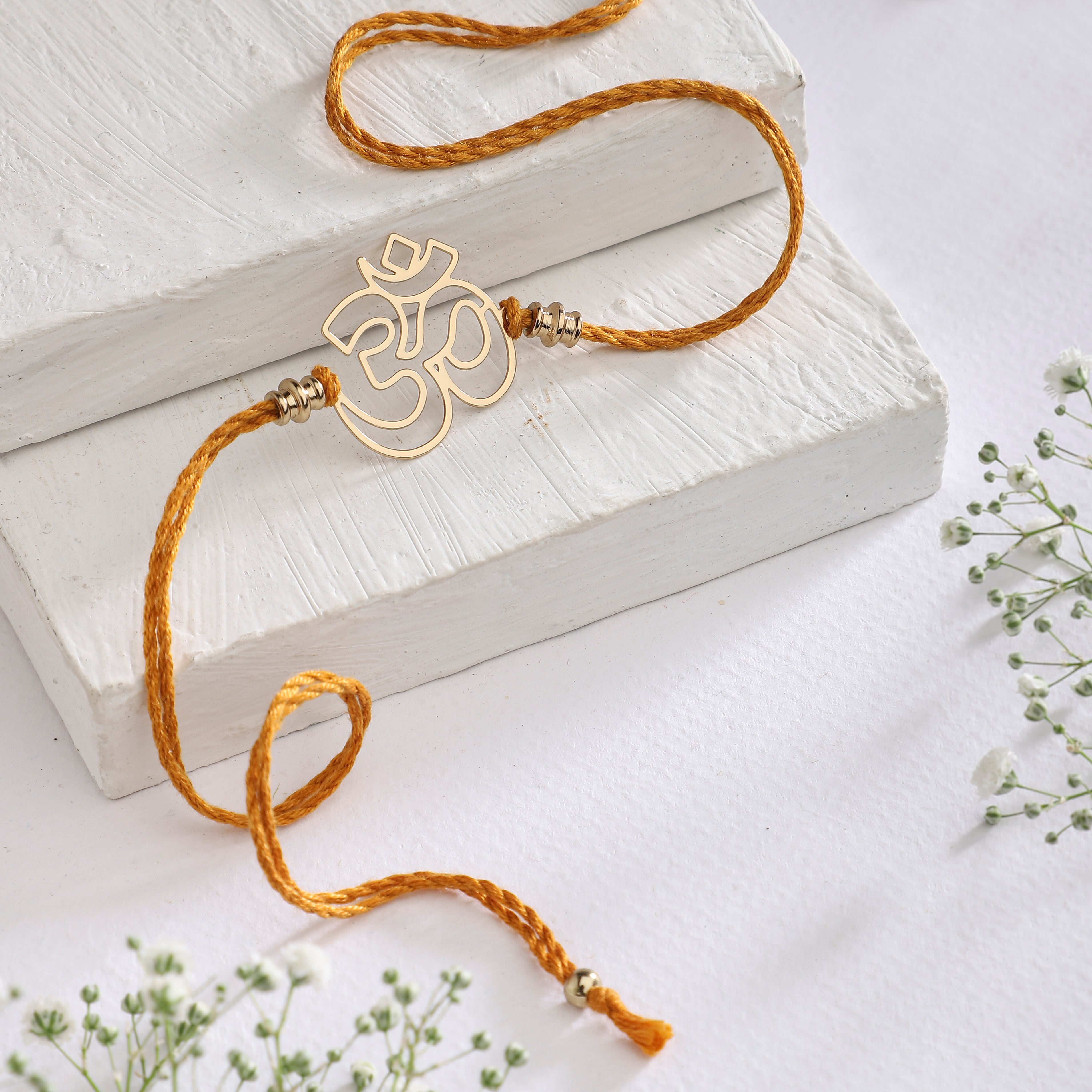 Rakhi Brass Om
