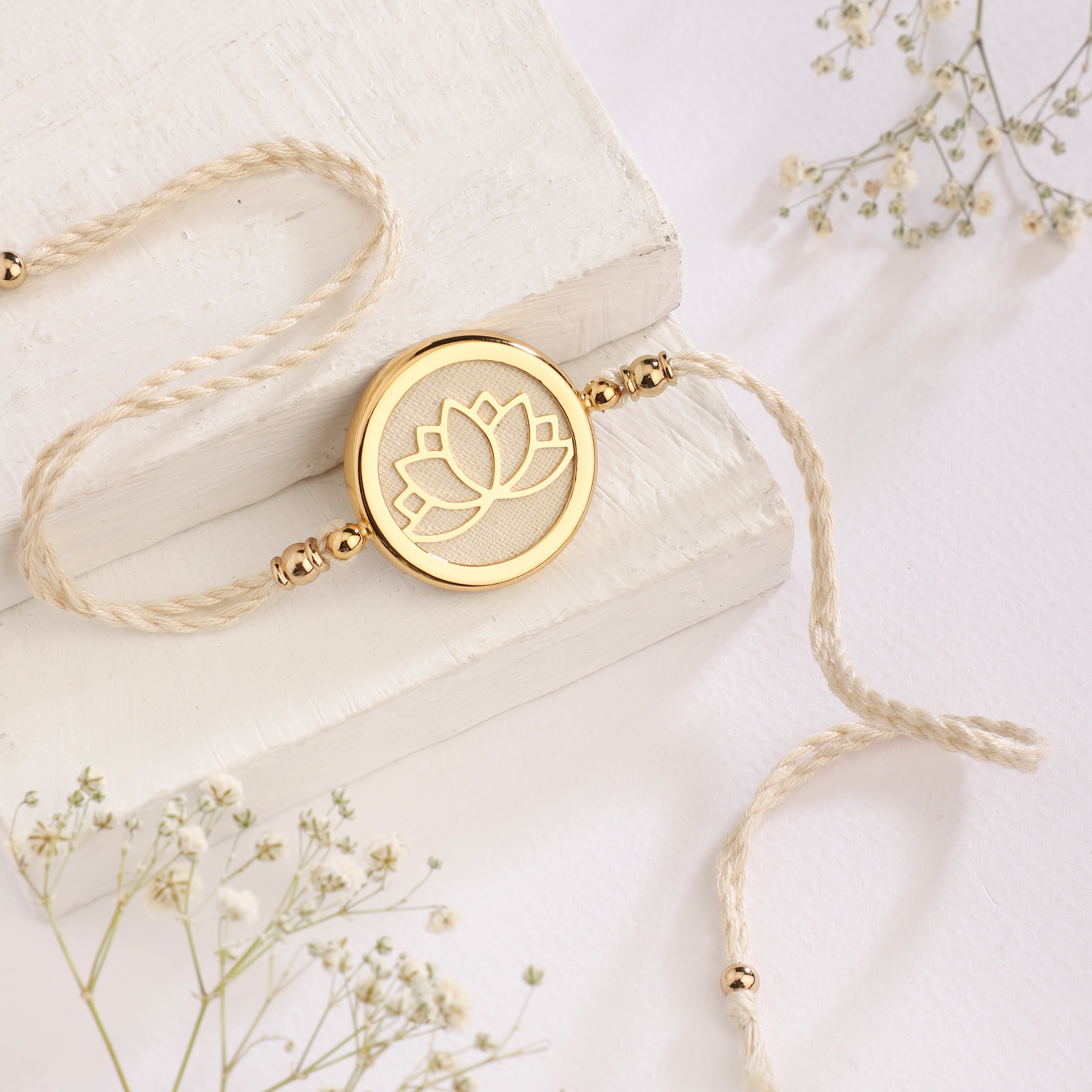 Goldplated Rakhi Yamini - Lotus
