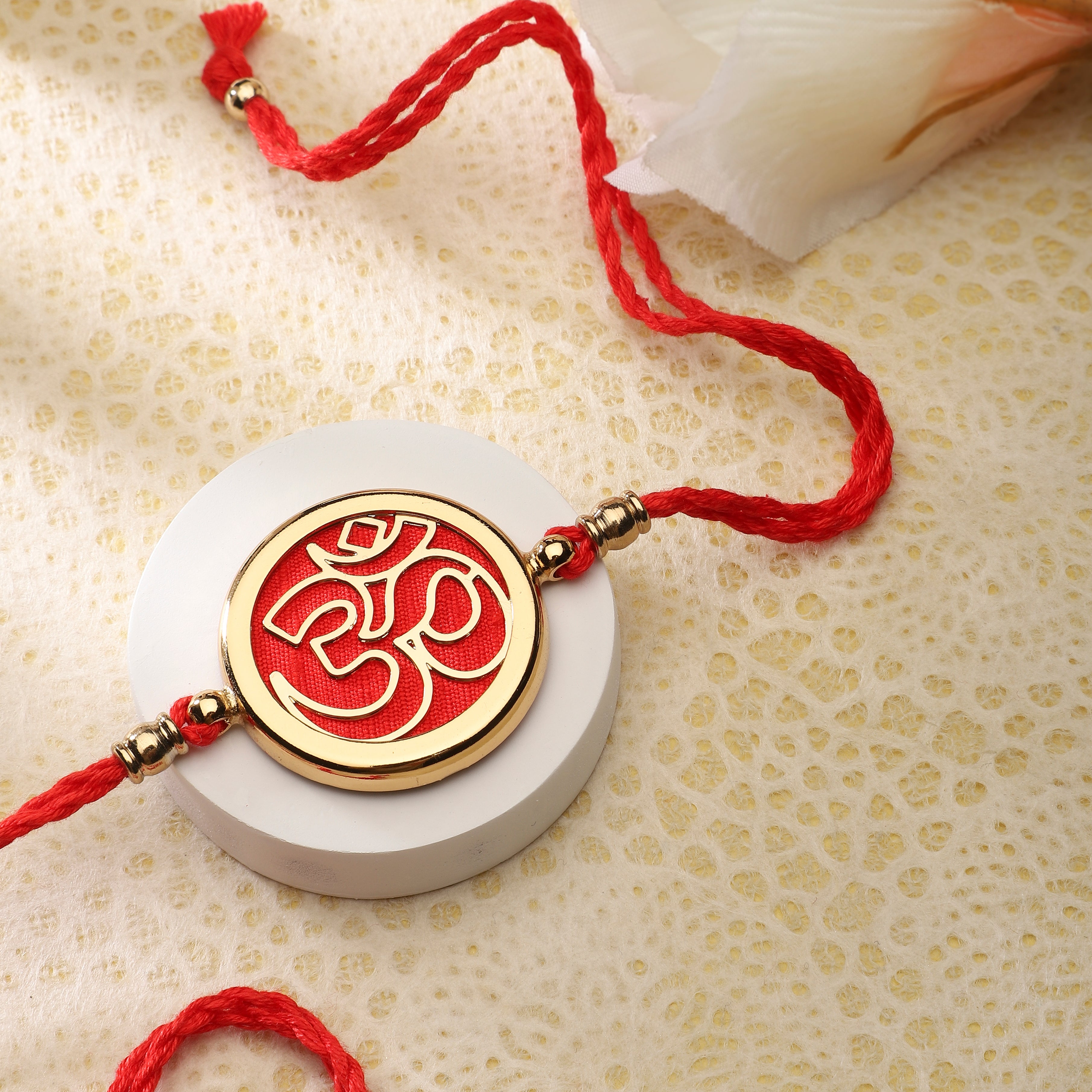 Goldplated Rakhi Yamini - Om