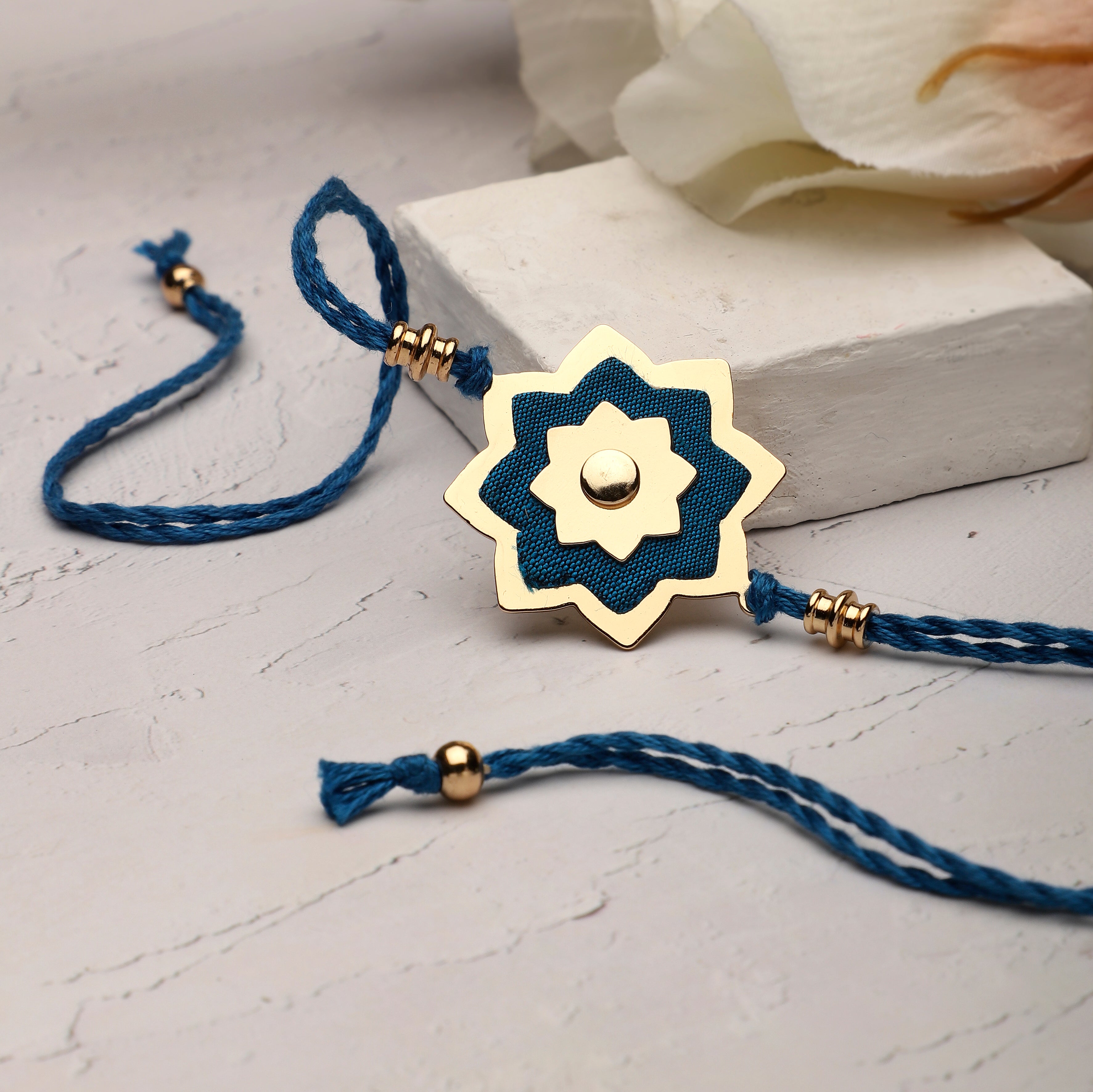 Rakhi Lotus - Layered Brass & Silk | Anand Prakash