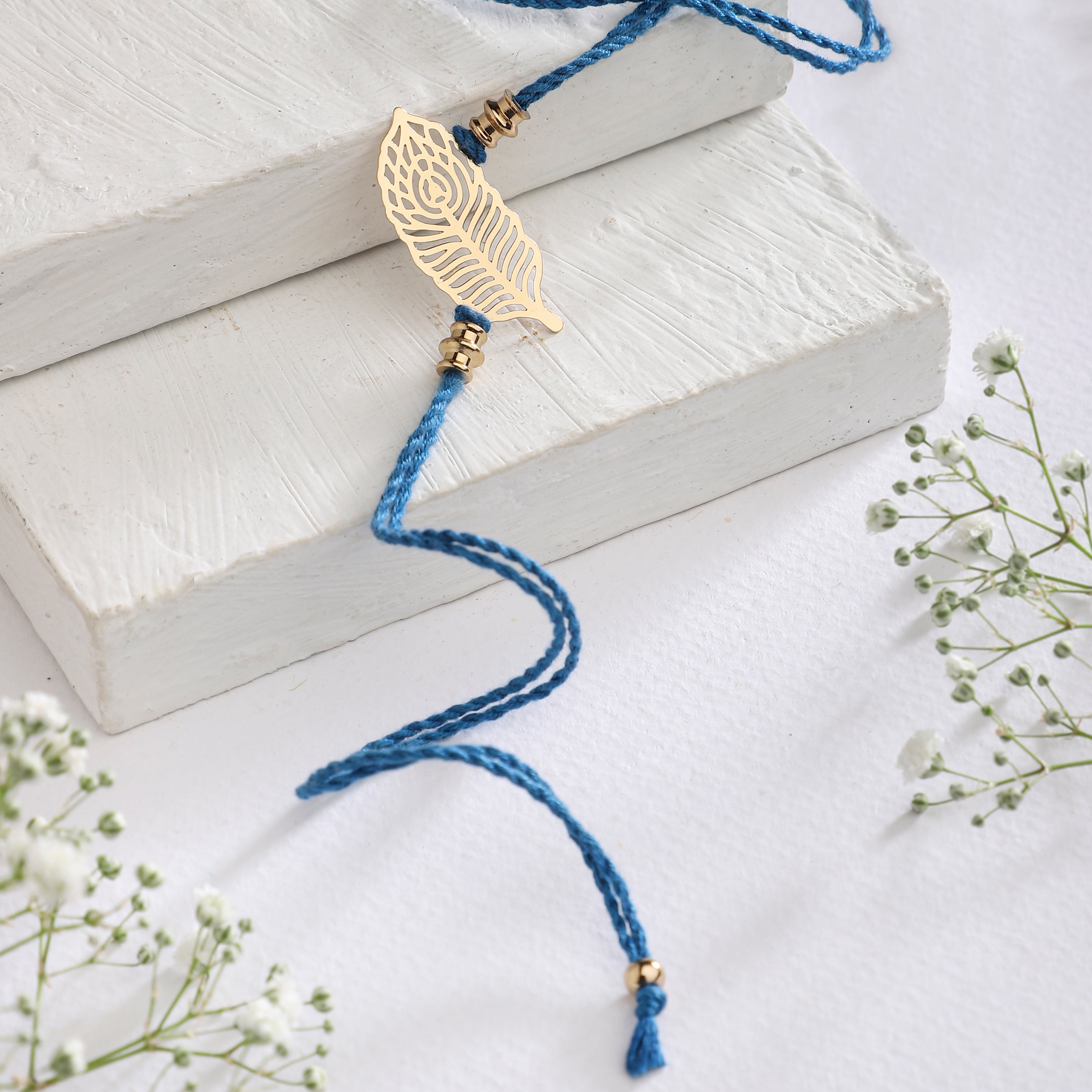 Rakhi Peacock Feather | Anand Prakash
